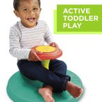 toddle boy on sit and spin toy - Wonderful World of Bree