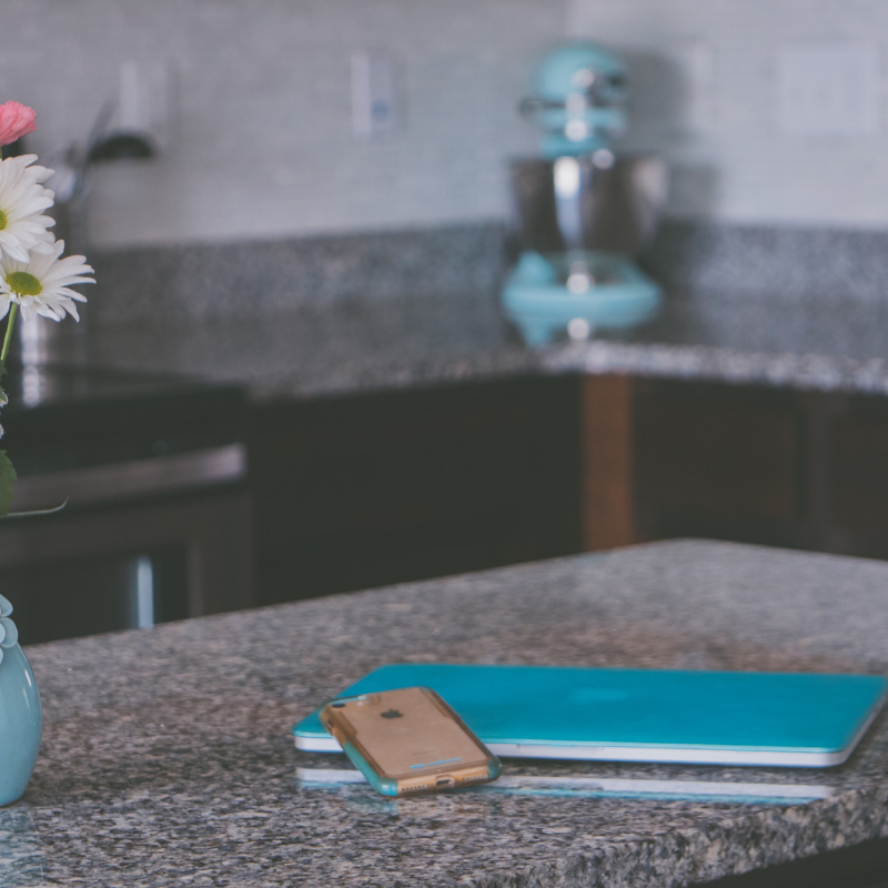 phone and computer in kitchen